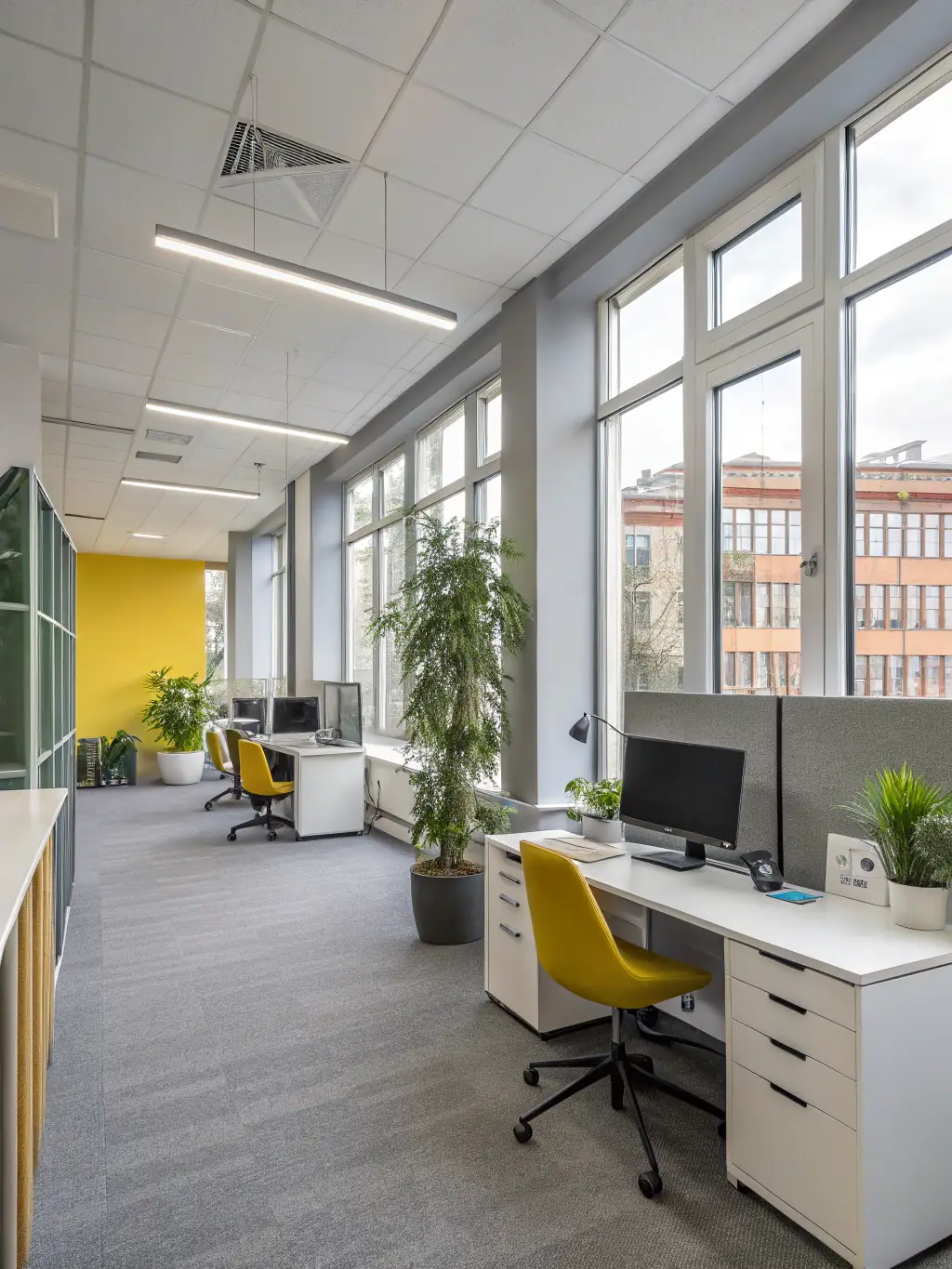 A renovated office interior with modern furniture and lighting, demonstrating professional commercial upgrades.